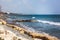 Empty stone beach on Limassol seafront on a sunny spring day