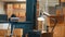 Empty storehouse space with cardboard boxes on shelves and racks