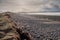 Empty Strandhill beach at low tide, low cloudy sky. Nobody, County Sligo, Ireland