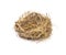 Empty straw nest with twigs on a white background