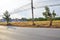 Empty street and Irrigation system on an orchard to supply the young fruit trees. 094