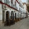 Empty street with restaurants in Sentenil de las Bodegas in Cadiz province, Andalusia, Spain.