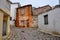 Empty street in small deserted village, greece