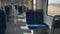 Empty suburban train coach in Munich, Germany. Interior with blue seats of a fast city train without people in Munchen