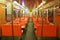 Empty subway car. Red seats. Railway. The interior of the train. Helsinki January 1, 2020.