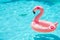 Empty Swimming Pool with Pink Flamingo Swimming Ring Cooling chill Summer season nobody