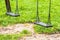 Empty swings at playground for child