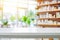 Empty table top with blurred pharmacy drugstore interior on background. Products presentation concept