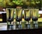 Empty tequila vodka shot glasses on outdoor bar counter