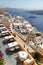 Empty terrace of a restaurant with overview over city and seaside, Fira, Santorini, Greece