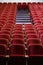 Empty theatre with red seats