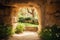 Empty tomb carved out of rock in a beautiful garden