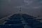 Empty top deck of the pictured rocks cruise boat during a rain storm and navigating through thick fog on lake superior