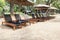 Empty tourist on beach bench of beautiful tropical resort.