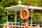 Empty tourist excursion boat moored to pier on lake closeup