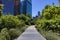 Empty Trail at Dutch Kills Green Park with Plants and Modern Skyscrapers in the Background in Long Island City Queens New York