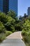 Empty Trail at Dutch Kills Green Park with Plants and Modern Skyscrapers in the Background in Long Island City Queens New York