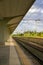 Empty Train Station Subway Platform in Calabria, South of Italy with Signs and Paths