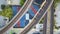 Empty train track, railroad transit, transportation bridges above basketball courts aerial, Chicago IL