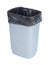 Empty trash container with black plastic bag on white background