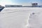 Empty tribunes on a stadium after heavy snowfall