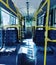 empty trolleybus with yellow handrails.