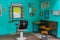 Empty turquoise hair salon and barber shop interior Bangkok Thailand