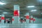 Empty underground car parking lot. Underground car parking garage at shopping mall or international airport. Indoor parking area.