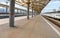 Empty, uninhabited platform of the railway station.