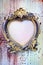 Empty vintage frame in form of a heart