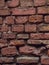 Empty Vintage Red Brick Wall Texture. Building Facade With Scratch Damage