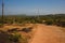 Empty walking road with red sand, to Gokarna