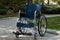 Empty wheelchair at the park, close-up, outdoors. Miracle concept