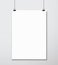 Empty white A4 sized vector paper mockup hanging with paper clip