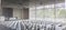 Empty white chairs in contemporary conference hall with