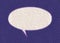 Empty white chat bubble on a background pattern of purple printing dots from a real vintage comic book page