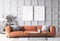 Empty white frame mock up. Orange leather sofa in Scandinavian living room. Gray background wall, home decoration