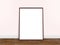 Empty white modern style photo frame on composition pink pastel