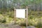 Empty white panel of forest information Wooden Advertisement Mockup