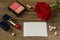 Empty white paper for text, red lipstick, rouge, rose flower and