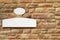 Empty White Street Signs On The Tiled Stonewall Facade Background