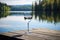 an empty wine glass on a lakeside table