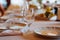 An empty wine glass on a table served for a banquet.