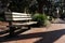 Empty Wood Bench at Monterey Square in the Historic District of Savannah Georgia