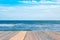 Empty wood desk and summer blue sea background .Blank space for text and images.Concept Summer, Beach, Sea, Relax, Party