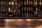 Empty wooden bar counter with defocused background