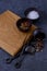 Empty wooden board for meat, salt and pepper