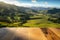 The empty wooden brown table top with blur background of New Zealand nature. Generative AI AIG30.