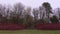 An empty wooden park bench in a local park