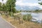 Empty wooden park bench overlooking Viroi lake